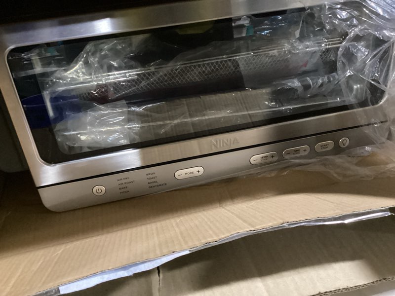 Condition photo showing Good Condition for Ninja Flip Toaster Oven&Air Fryer, 8-in-1 Functionality, Flip Up&Away Capability for Storage Space, LargeCapacity, Air Fry Basket, SheetPan, Wire Rack&Removable Crumb Tray, Stainless,1800 watts, SP151 Stainless Premium 8-in-1 Flip Oven