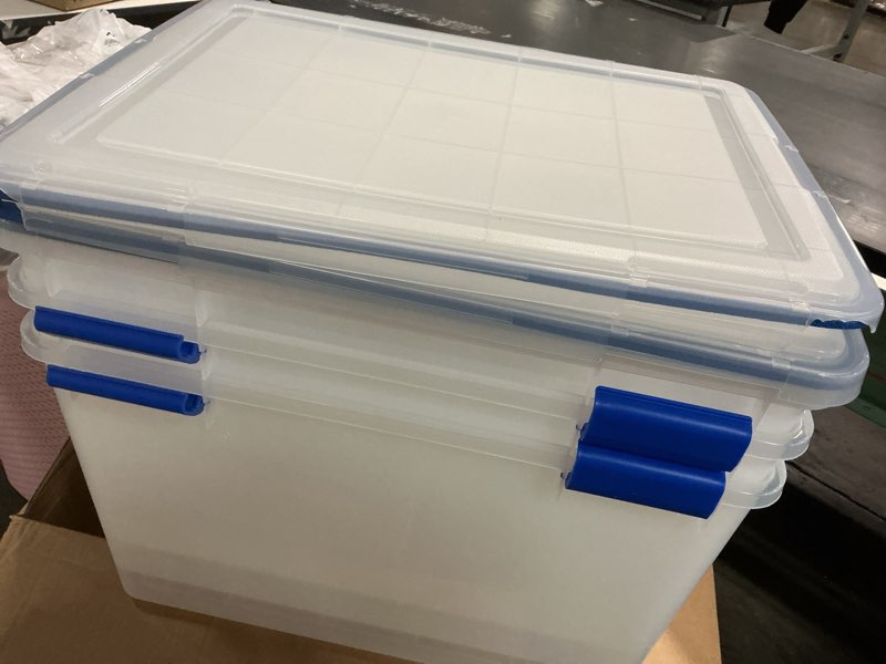 Condition photo showing As Is for IRIS USA WeatherPro 74 Qt Storage Bins with Lids, 3 Pack, BPA-Free Plastic Gasket Box with Tight Latch and Seal, Stackable Nestable Tote Tub - Clear/Blue 74 Qt. - 3 Pack