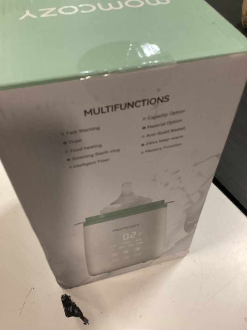 Condition photo showing New/Like New for momcozy bottle warmer, fast bottle warmers for all bottles with timer, accurate temperature control and automatic shut-off, multifunctional bottle warmer for breastmilk green+white
