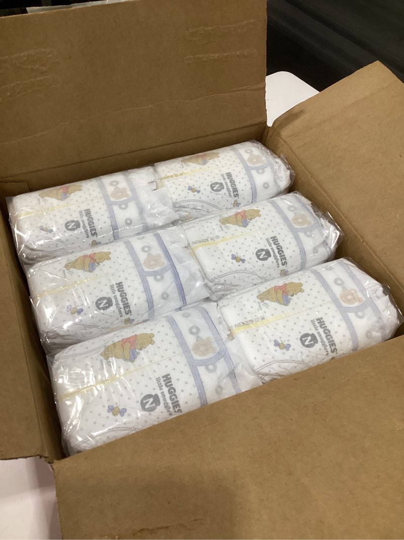 Condition photo showing Good Condition for huggies size newborn diapers, little snugglers baby diapers, size newborn (up to 10 lbs), 144 count, packaging may vary