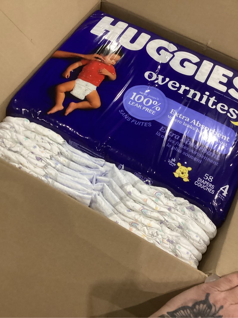 Condition photo showing As Is for Huggies Size 4 Overnites Baby Diapers: Overnight Diapers, Size 4 (22-37 lbs), 116 Ct (2 Packs of 58), Packaging May Vary Size 4 116