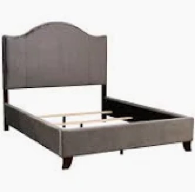 Upholstered scalloped bed