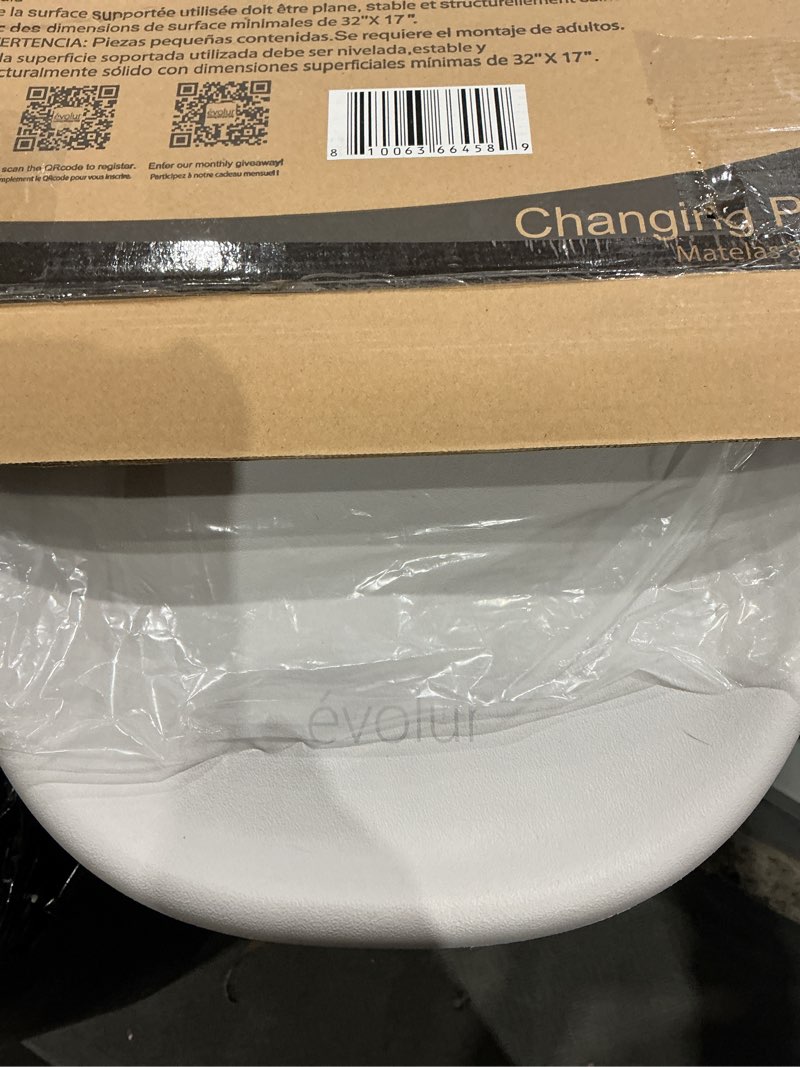 Condition photo showing Good Condition for evolur eva baby changing pad in light gray, soft, lightweight and portable changing pad, fits all changing table, waterproof firm padding