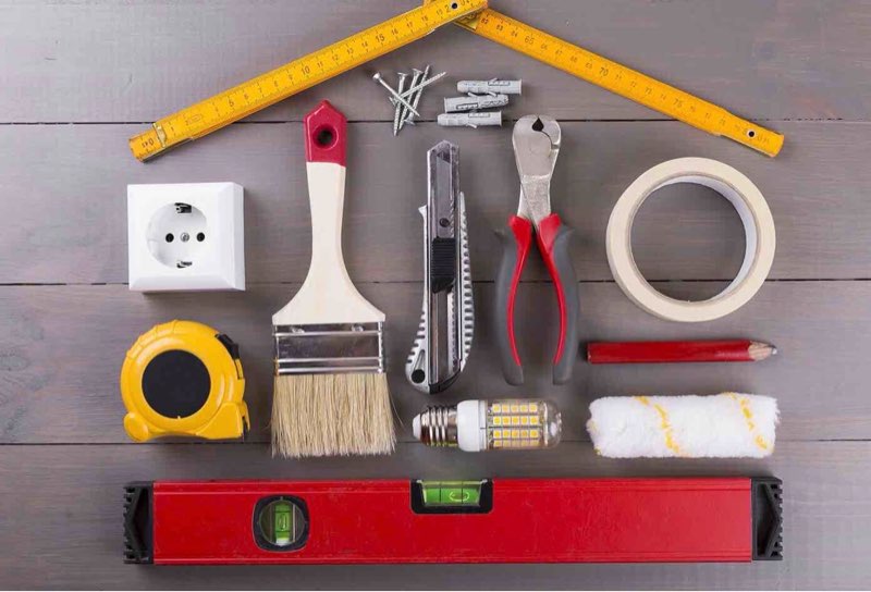 mixture of small miscellaneous loose tools, screws, latches, home repair accessories