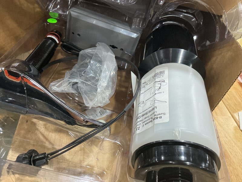 Condition photo showing Good Condition for sureflo automatic counter mounted soap dispenser 