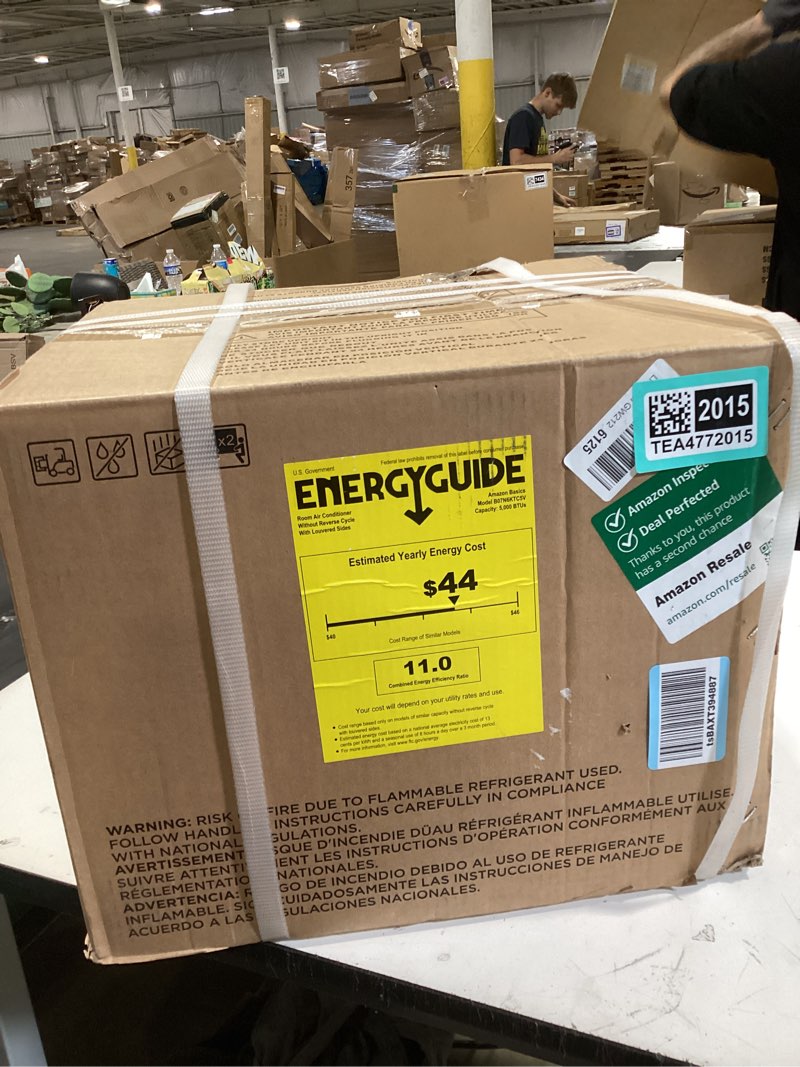 Condition photo showing New/Like New for amazon basics 5000-btu window air conditioner with quiet operation, up to 150 sqf, cool and fan functions, washable filter, adjustable window kit, intuitive mechanical controls, for small room, white white 5000 btu