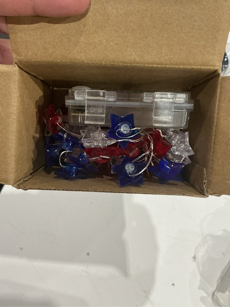 Condition photo showing Good Condition for waterglide 1 pack 4th of july string lights, 16ft 50led red white and blue patriotic star lights, battery operated with 8 modes & timer, waterproof indoor outdoor for memorial day independence day