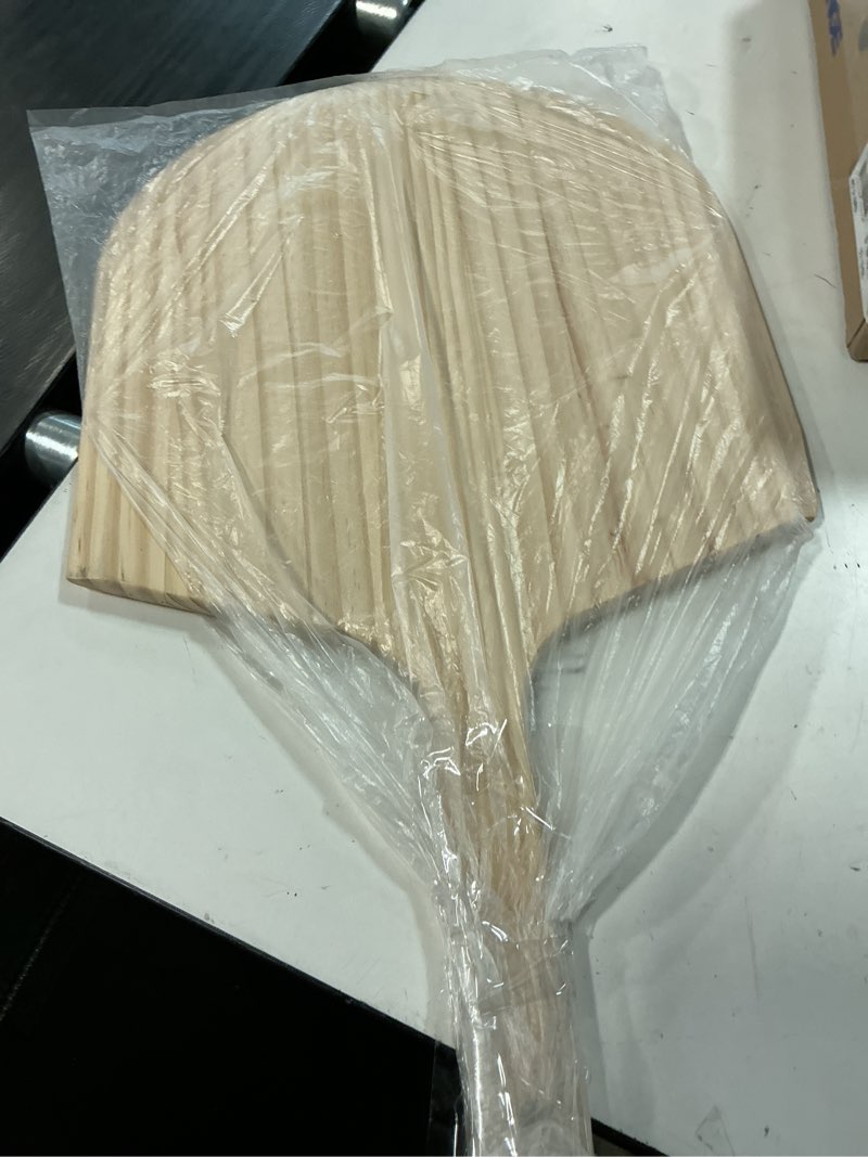 Condition photo showing New/Like New for winco 24" pizza peel, 14 x 15" blade, wooden