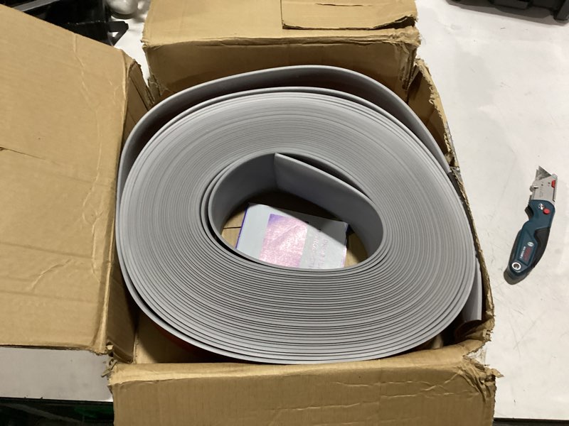 Condition photo showing New/Like New for fonuno vinyl wall base rubber baseboard molding trim self adhesive 4" wide | vinyl cove base molding flexible baseboard trim for floor walls, peel and stick design, 4 inch x 100 feet, gray gray 4in x 100ft