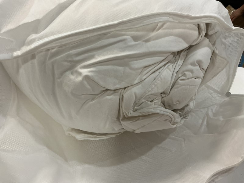 Condition photo showing As Is for premium down comforter, king/cal king, down