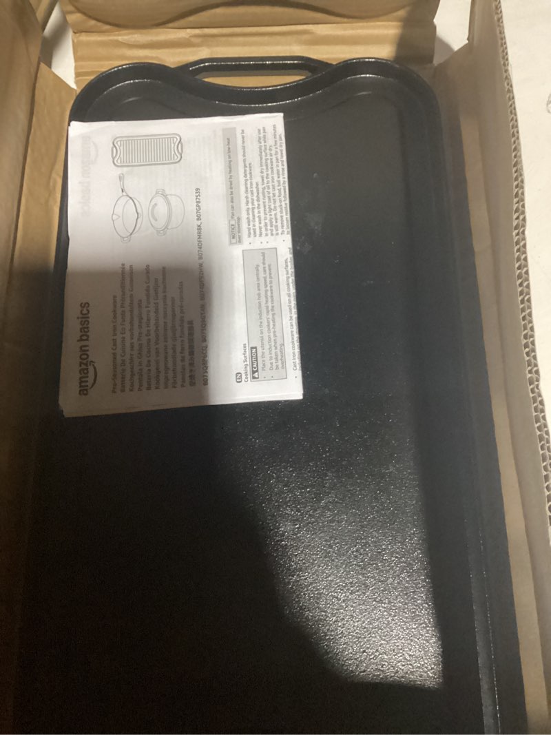 Condition photo showing Good Condition for Amazon Basics Pre-Seasoned Cast Iron Reversible Rectangular Grill/Griddle, Black, 20 x 10.63 x 0.98 inch