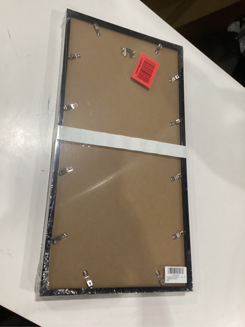 Condition photo showing New/Like New for fxojyvo 11x22 newspaper frame set of 2, display 11 x 22 inch newspaper front page for wall, light weight and high transparent picture frame - 2 pack/black/11by22 black 11x22-2pack