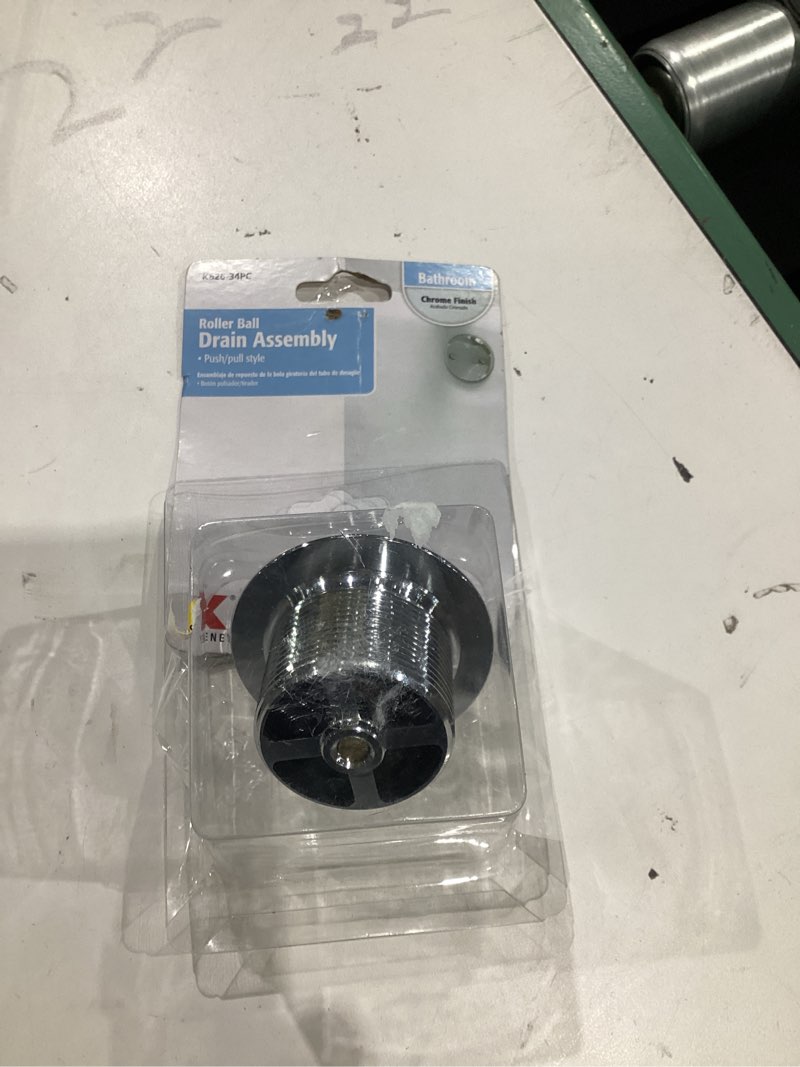 Condition photo showing As Is for keeney 1.5-in chrome roller ball drain with brass