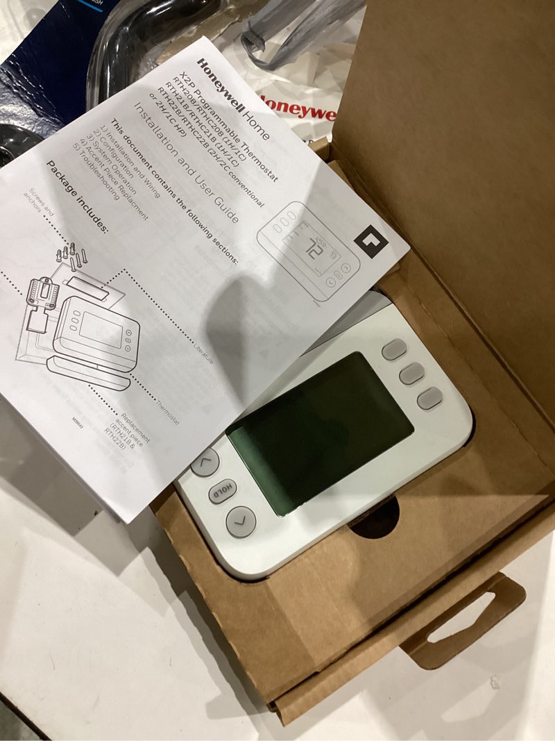 Condition photo showing As Is for honeywell home x2p two-stage 24-volt selectable-flexible programmable thermostat