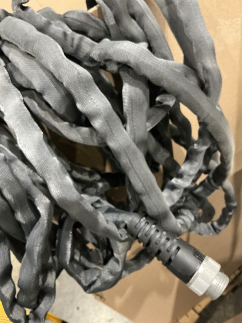 Condition photo showing As Is for zero-g teknor apex 5/8-in x 50-ft premium -duty kink free woven gray hose