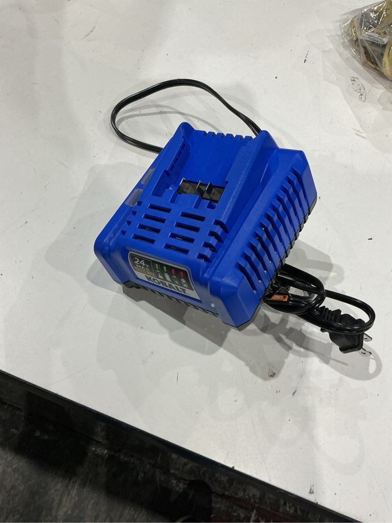 Condition photo showing As Is for k.balt 24-v lithium-ion battery and charger (2 ah)