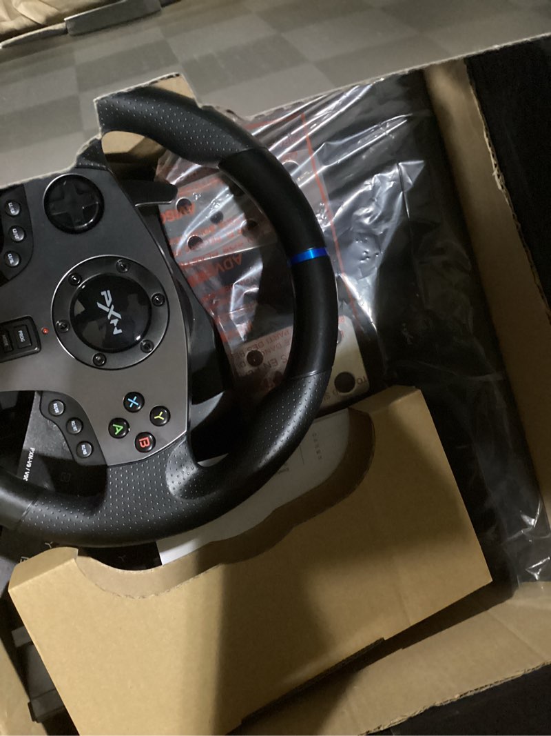 Condition photo showing Good Condition for PXN PC Steering Wheel, V9 Universal Usb Car Sim 270/900 Degree Race Steering Wheel with 3-Pedals and Shifter Bundle for PC, Xbox One, Xbox Series X/S, PS4, PS3, Switch (Black)