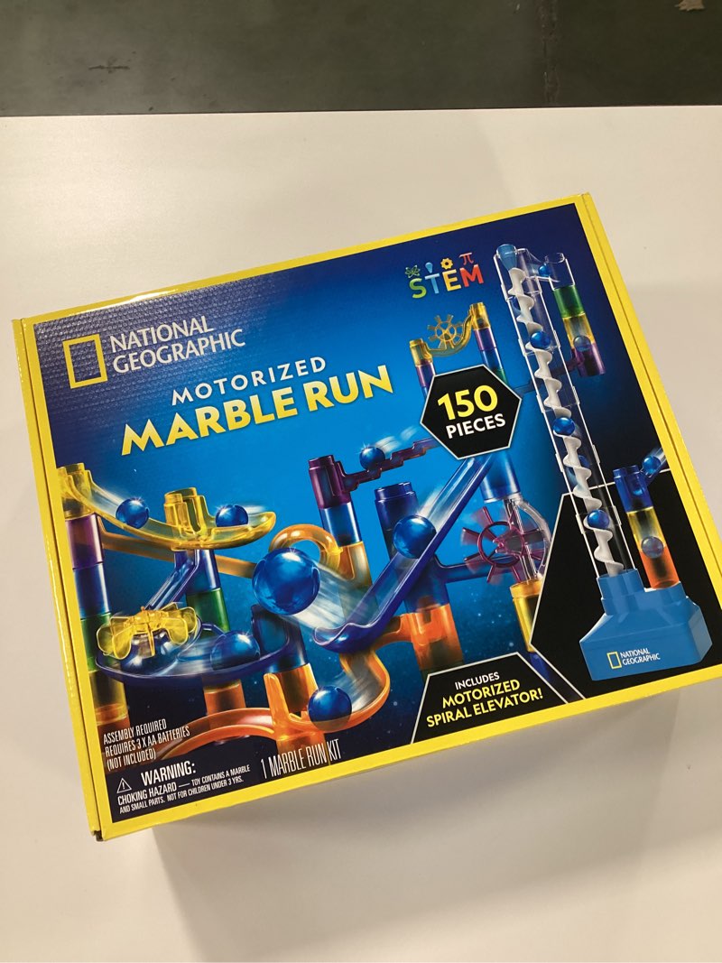Condition photo showing New/Like New for National Geographic Marble Run with Motorized Elevator - 150-Piece Marble Maze Kit with Motorized Spiral Lift, 30 Marbles, Storage Bag & More, Perpetual Motion Machine, Kids Physics Toys