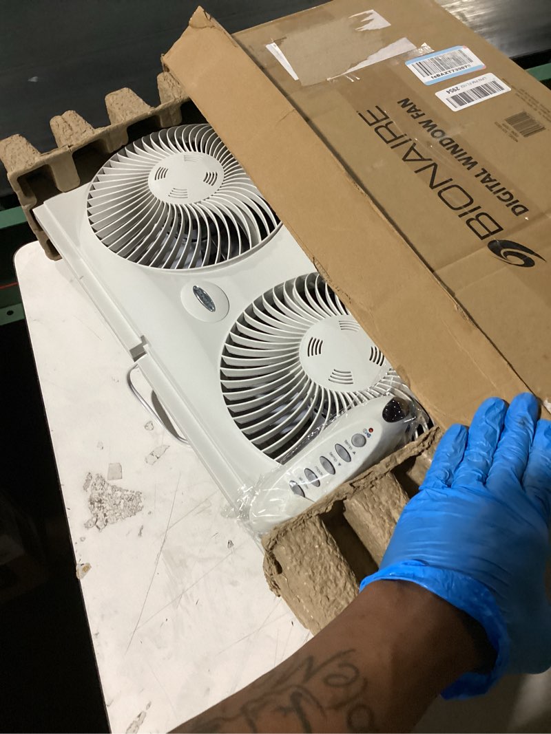 Condition photo showing Good Condition for bionaire window fan with reversible airflow blades – 3-speed settings, programmable thermostat, led display, remote control, fits 24–36" windows, no assembly required white 2 blades electronic control with lcd screen window fan