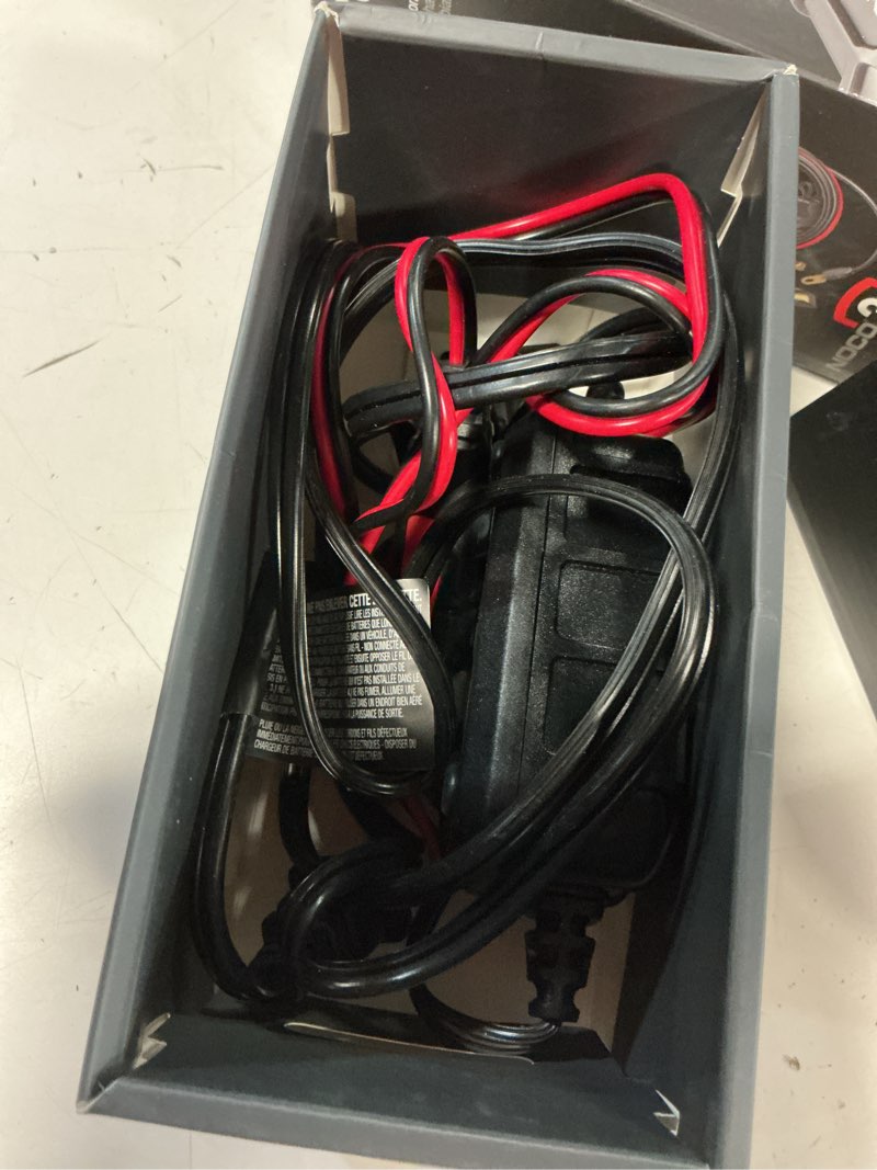 Condition photo showing As Is for noco genius2: 2a 6v/12v smart battery charger – automatic maintainer, trickle charger & desulfator with overcharge protection & temperature compensation – for lead-acid & lithium batteries