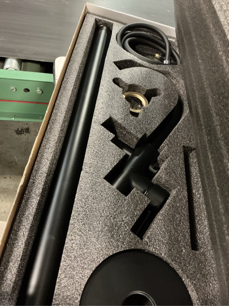 Condition photo showing As Is for woodbridge f0006 mbrd faucet, (l) 10 3/4" x (w) 6-1/4" x (h) 43-7/8, matte black matte black round hand shower