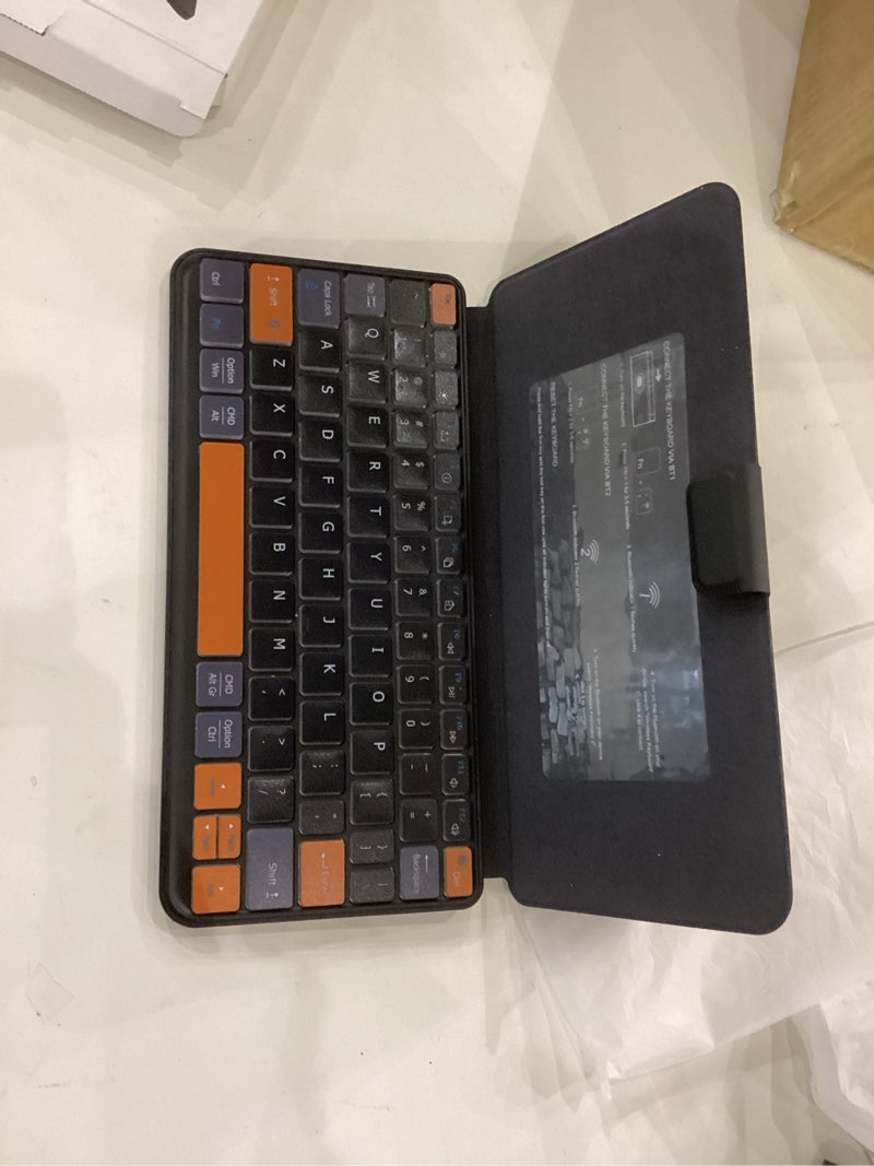 Condition photo showing Good Condition for Universal Travel Keyboard Plus, New Dual Bluetooth Portable Keypad with 7-Color Backlit & Any-Angle Stand, Wireless Tablet Keyboard for iPad/Z Fold/Galaxy Tabs/Phones, Keypad for iOS/Android/Windows Black