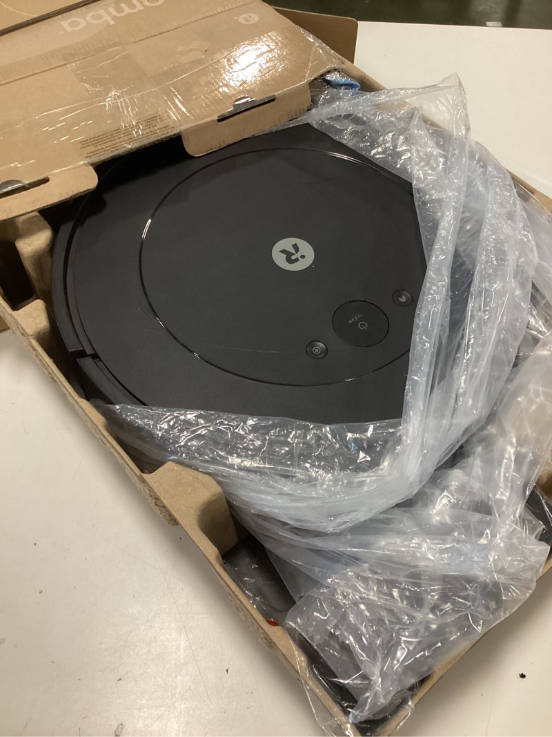 Condition photo showing As Is for iRobot Roomba Robot Vacuum and Mop Combo (Y0140) - Vacuums & mops, Easy to use, Power-Lifting Suction, Multi-Surface Floors, Smart Navigation, Cleans in Neat Rows, Self-Charging, Bagless, Space-Saving Roomba Y0140