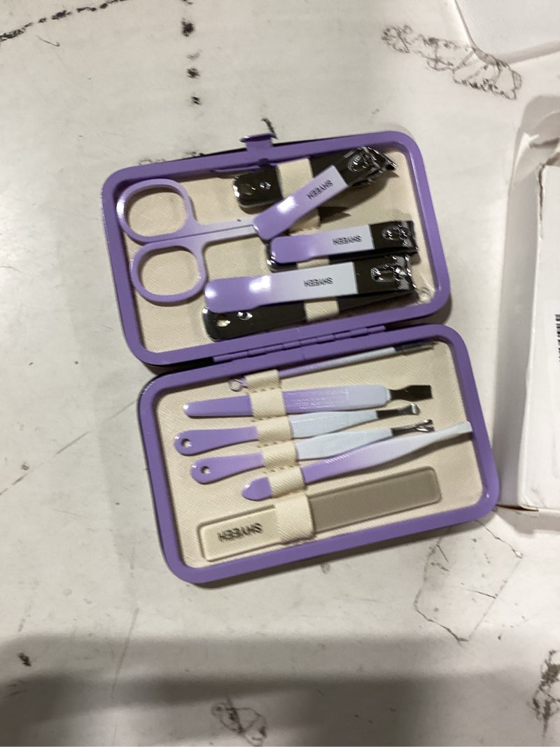 Condition photo showing Good Condition for manicure set, 10 pcs high-carbon steel nail clippers set, portable mini manicure and pedicure kit, travel grooming nail kit with leather bag for men and women purple