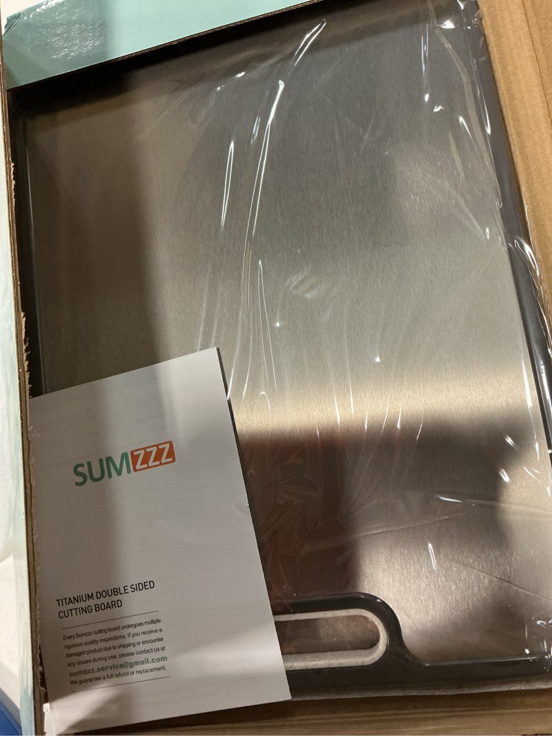 Condition photo showing New/Like New for titanium cutting board for kitchen, double sided chopping board, 99.9% pure titanium & pp, non-porous, odor resistant, safe for raw & cooked food, easy to clean, large 15”×10.3” silver set of 1 (16" x 11")