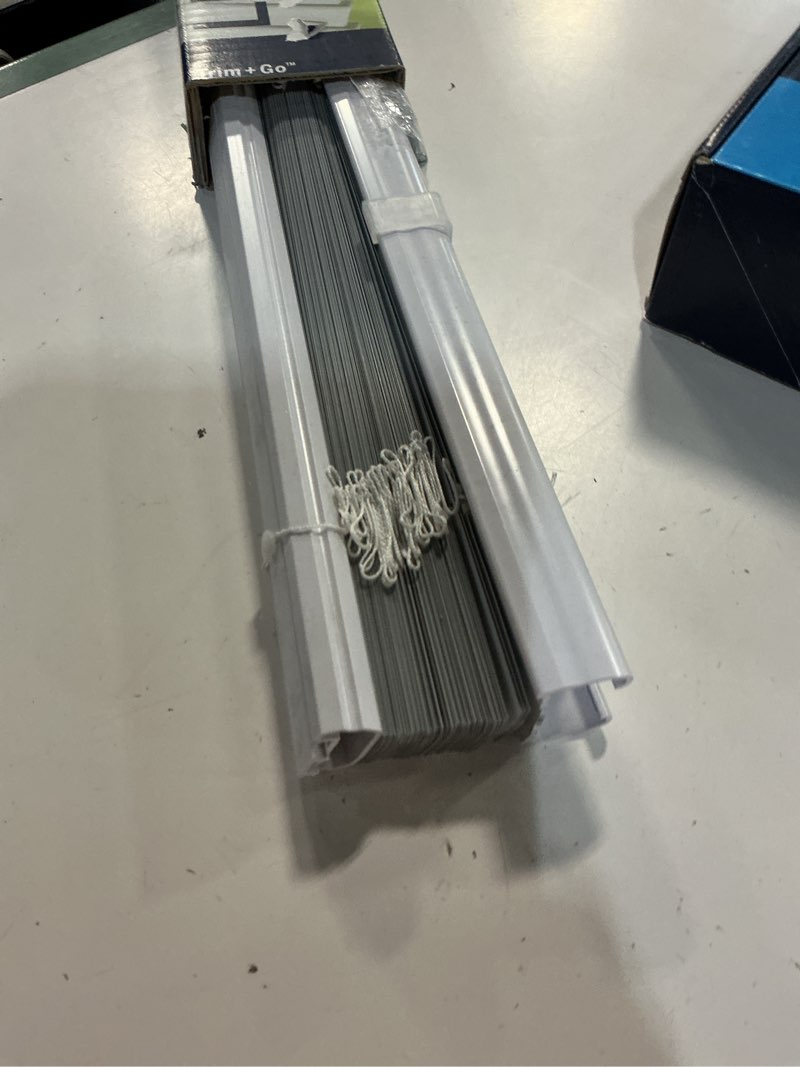Condition photo showing As Is for levolor trim+go 1-in slat width 23-in x 72-in cordless white aluminum room darkening mini-blinds