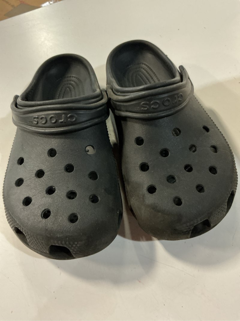 Condition photo showing As Is for crocs classic black waterproof clogs - size mens 5-womans 5crocs