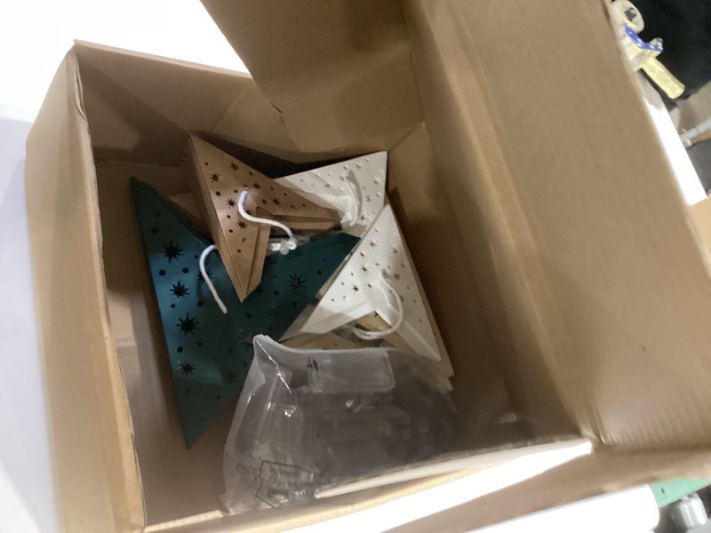 Condition photo showing Good Condition for 12 pcs christmas paper star lantern 7/8/9 points sage green hanging ornament 3d neutral star lantern with string light 12 and 17.72 inch hollow lampshade for xmas party decor(7 pointed)