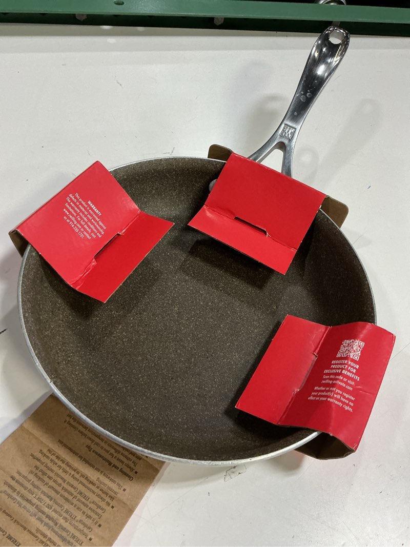 Condition photo showing As Is for zwilling energy plus 8-inch stainless steel ceramic nonstick fry pan stainless steel 8-in