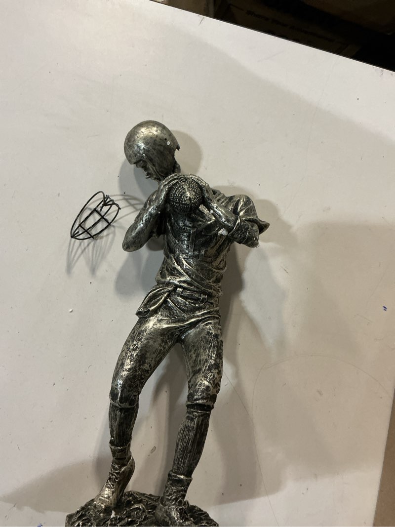 Condition photo showing As Is for Deco 79 Polystone Football Player Decorative Sculpture Home Decor Statue, Accent Figurine 6" x 6" x 16", Silver