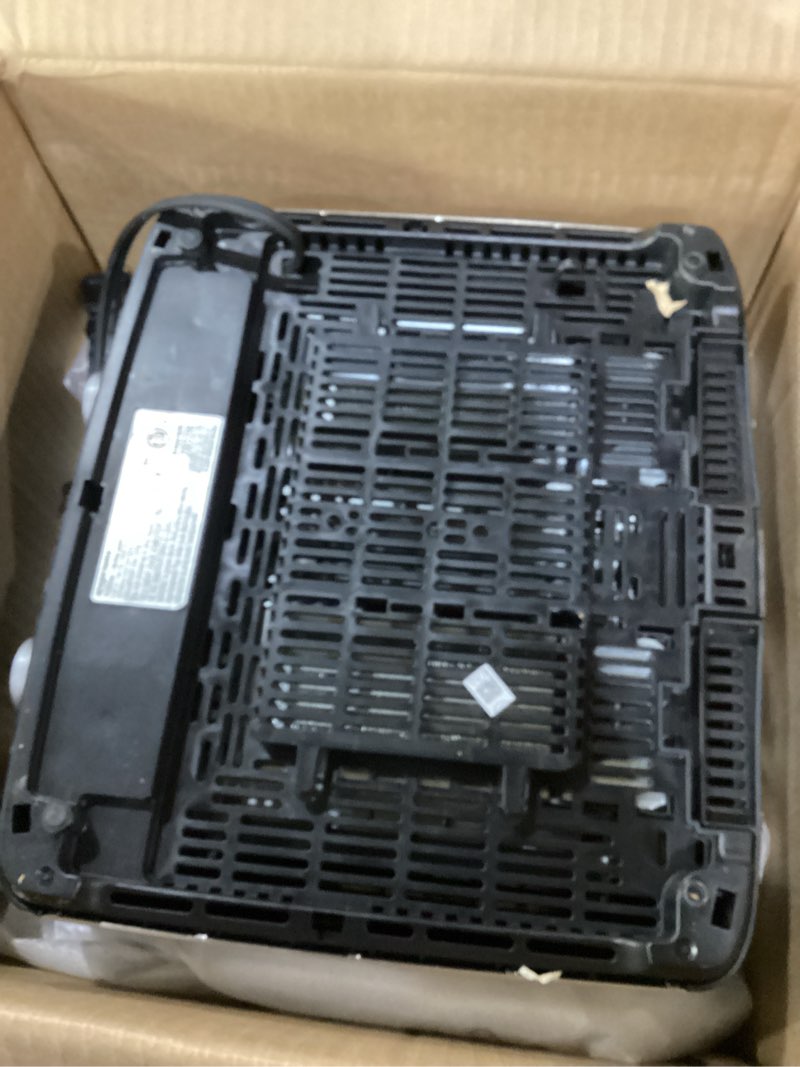 Condition photo showing Good Condition for amazon basics 4 slice toaster, with 7 browning settings, extra wide slots for bagels and special breads, removable easy-to-clean crumb trays, cancel/defrost/bagel buttons, 1500w, black & silver