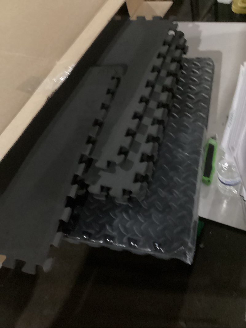 Condition photo showing As Is for ProsourceFit Puzzle Exercise Mat ½ in, EVA Interlocking Foam Floor Tiles for Home Gym, Mat for Home Workout Equipment, Floor Padding for Kids, Black, 24 in x 24 in x ½ in, 48 Sq Ft - 12 Tiles Black 12 Pack (48 SQ FT)