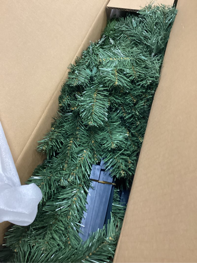 Condition photo showing Good Condition for national tree company 4 ft pre-lit grande canadian fir mini artificial christmas tree, 100 clear lights, 230 tips, includes stand, green 4ft 100 clear lights