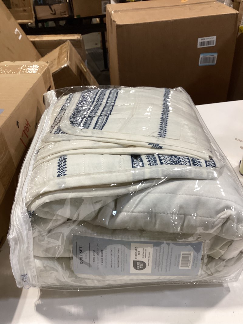 Condition photo showing Good Condition for great bay home king reversible quilt bedding set - all season, modern, lightweight bedspreads - white and navy striped coverlets (includes 1 quilt, 2 pillow shams)