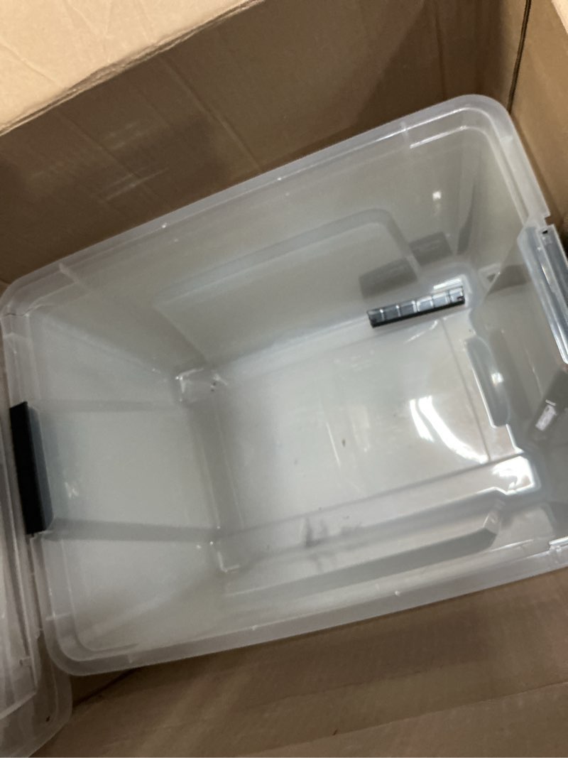 Condition photo showing As Is for IRIS USA 54 Qt Stackable Plastic Storage Bins with Lids, 6 Pack - BPA-Free, Made in USA - See-Through Organizing Solution, Latches, Durable Nestable Containers, Secure Pull Handle - Clear Clear 54 Qt 6 Pack
