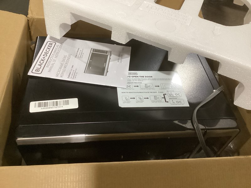 Condition photo showing As Is for BLACK+DECKER EM720CB7 Digital Microwave Oven with Turntable Push-Button Door, Child Safety Lock, 700W, Stainless Steel, 0.7 Cu.ft