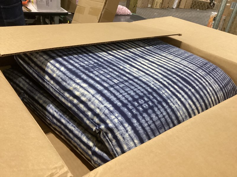 Condition photo showing New/Like New for arden outdoor patio dining chair cushion, 20x44, rain-proof seat pad, fade-resistant outdoor cushion blue shibori stripe 1 pack blue shibori stripe