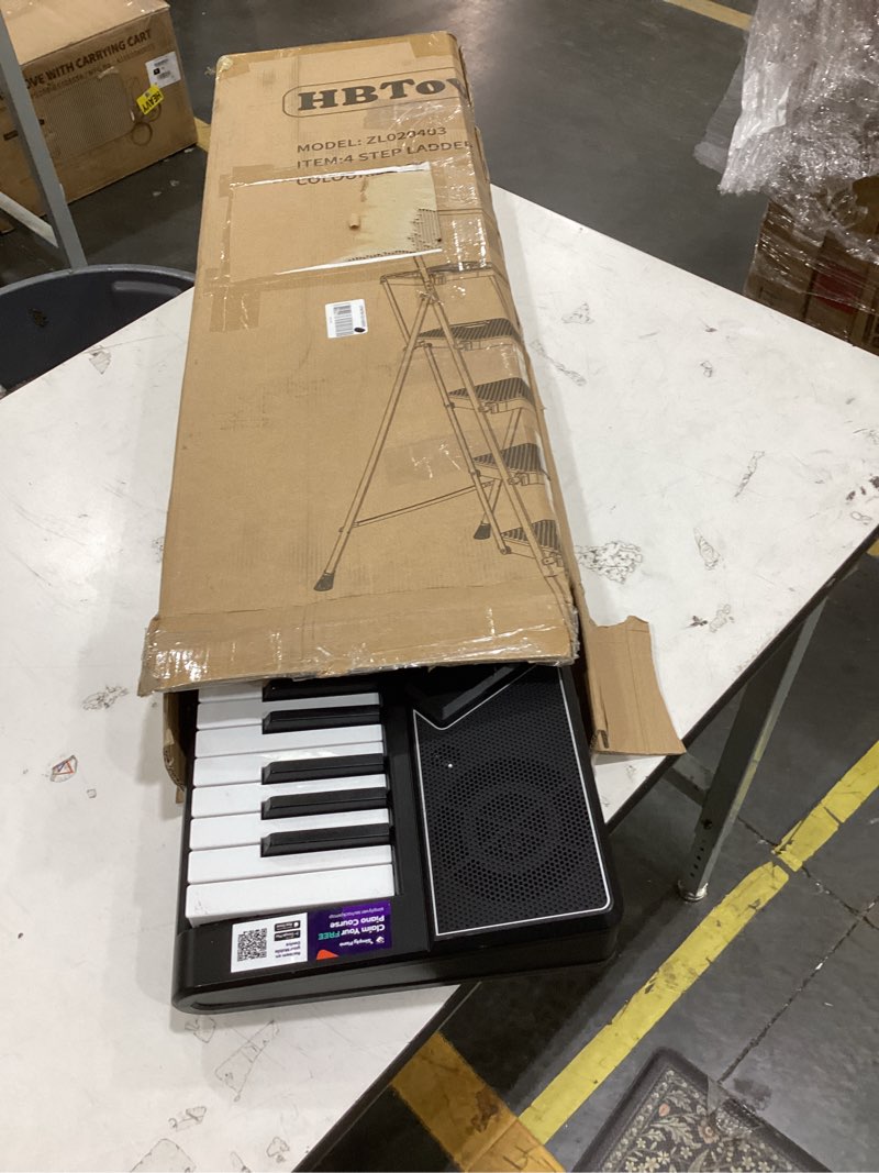 Condition photo showing As Is for rockjam 61 key keyboard piano stand with pitch bend kit, piano bench, headphones, simply piano app & keynote stickers 61 key kit with pitch bend