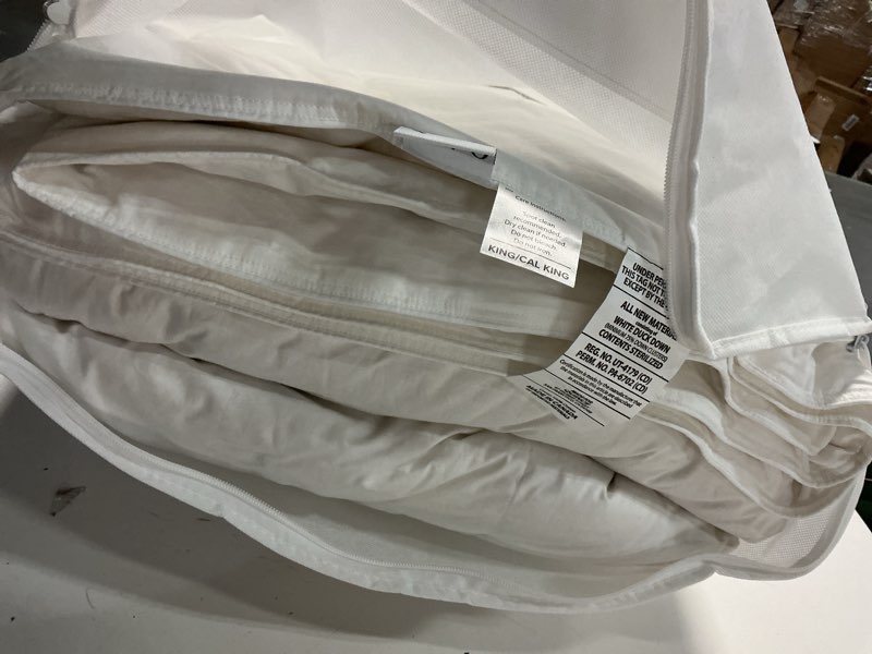 Condition photo showing As Is for premium down conforter cal king white 