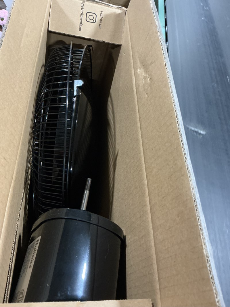 Condition photo showing Good Condition for holmes 12 inch oscillating table fan 3 speeds 75 degree wide angle oscillation adjustable 15 degree tilt quiet operation home office bedroom kitchen black