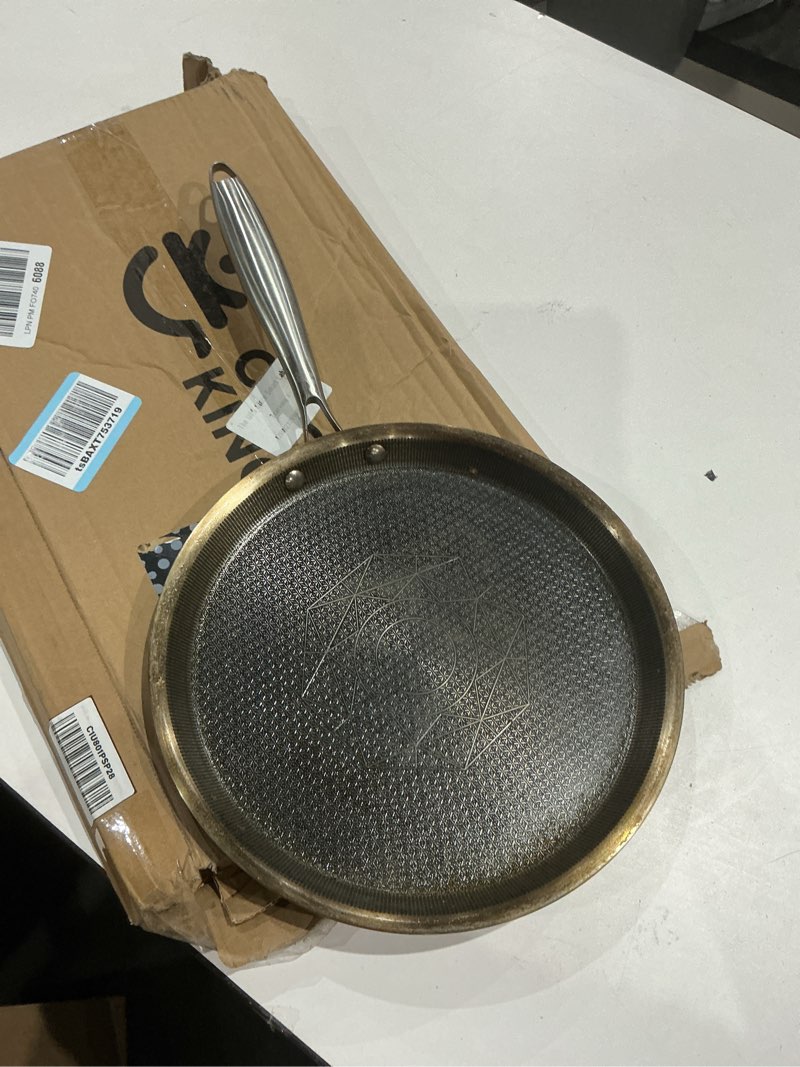 Condition photo showing As Is for cooker king 11" round griddle pan, 3-ply hybrid stainless steel crepe pan with stay-cool handle, non stick & non toxic for pancake, eggs, all stovetop & induction compatible, oven & dishwasher safe silver 11inch