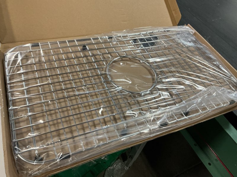 Condition photo showing Good Condition for serene valley sink bottom grid 23" x 13", centered drain with corner radius 2", ndg2313c