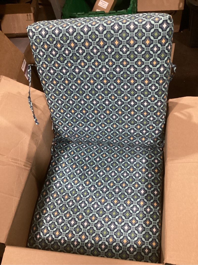 Condition photo showing As Is for arden outdoor midback chair cushion, 18 x 16.5, rain-proof, fade resistant 18 x 16.5, alana tile 18 x 16.5 mid back alana tile