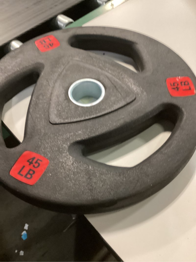 Condition photo showing Good Condition for Signature Fitness Vinyl Coated Cast Iron Plate Weight Plate for Strength Training and Weightlifting, Standard or Olympic, Multiple Sizes N. 45LB (Single) 2-Inch Center (Olympic)
