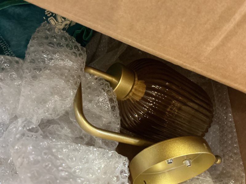 Condition photo showing As Is for 2 pack bulb lights gold lighting fixtures glass, iron wall sconces