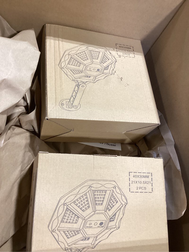 Condition photo showing Good Condition for Solar Lights Outdoor, 168LED 6500K Flood Light Dusk to Dawn, 8 Sides Solar Outdoor Lights with Motion Sensor, IP66 Waterproof Solar Street Lights Outdoor for Yard, Pools(4 Pack) 6500K 4PCS 4